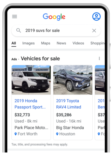 Phone with a google search results page showing vehicle ads for SUVs